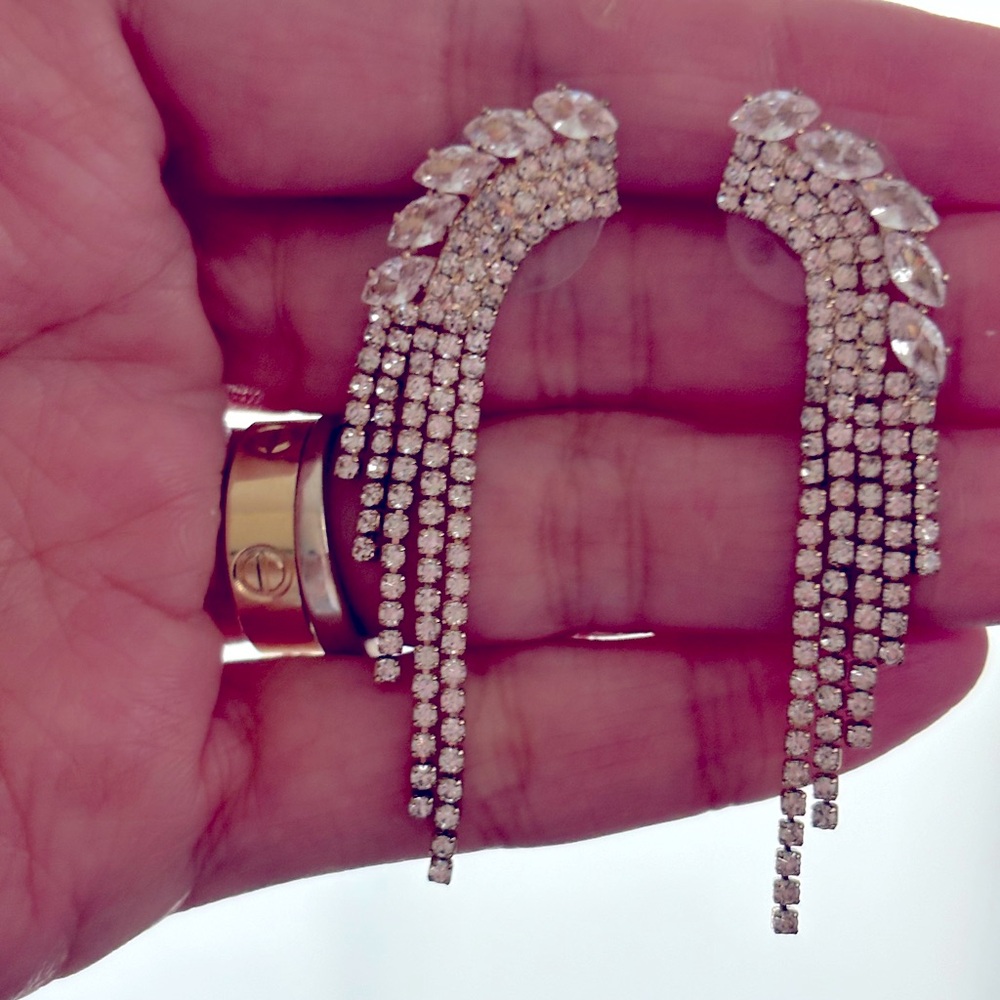 Fancy rhinestone halo earrings. It’s classy and fun and hypo allergenic